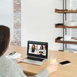 Woman on Zoom coaching call on laptop